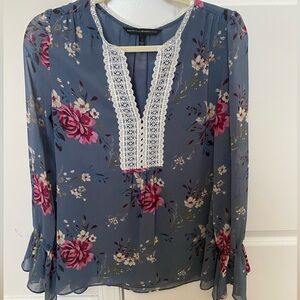 Gorgeous blouse with beautiful details.